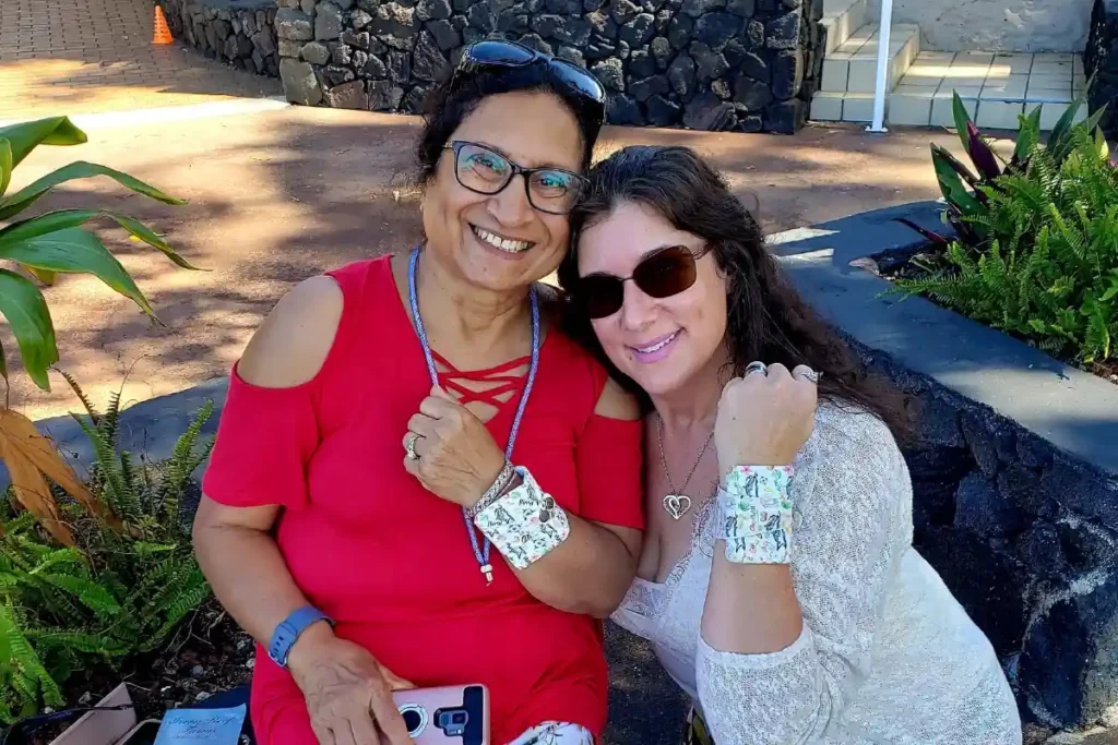 Two women smiling together